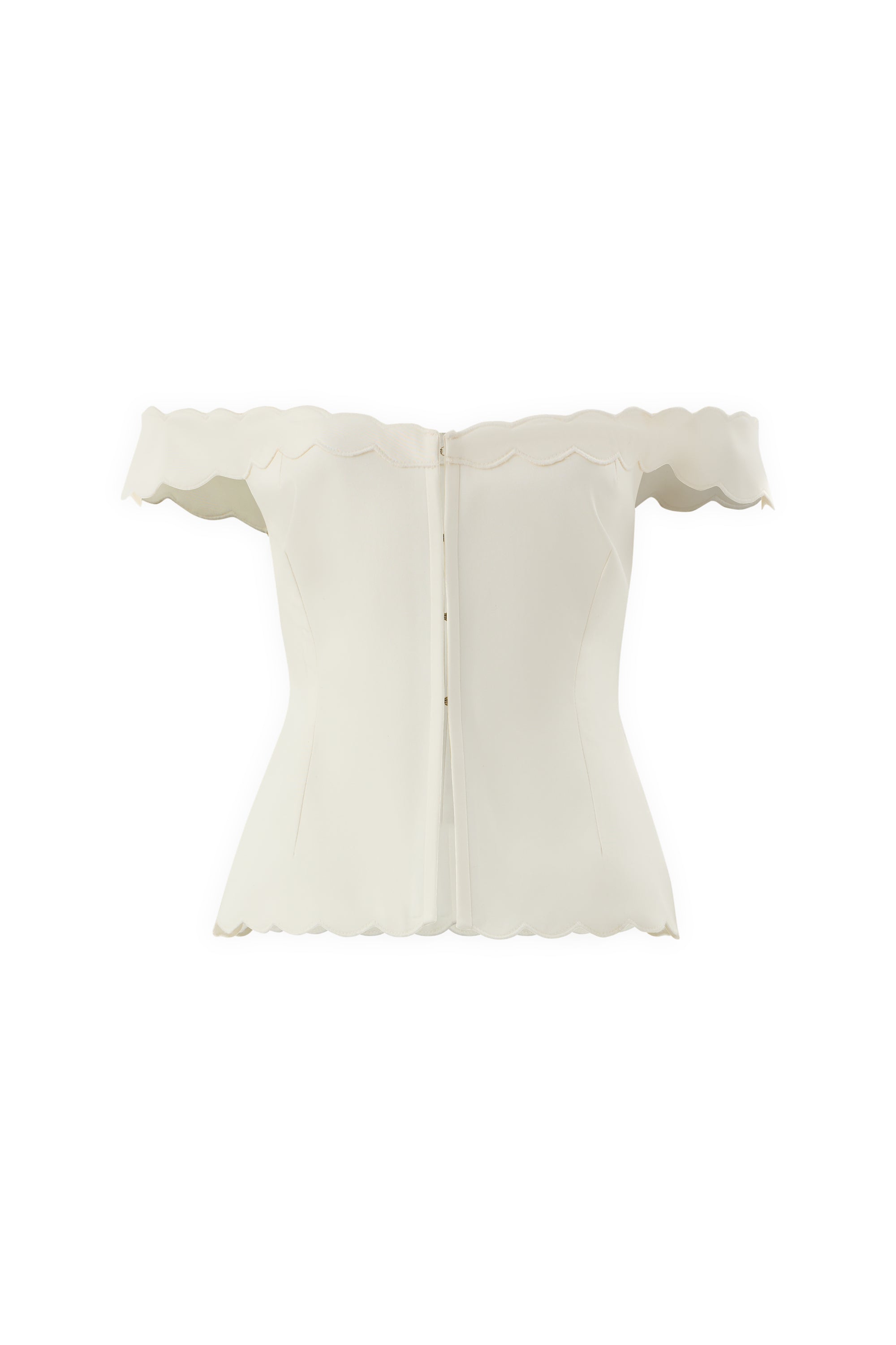 The IVORY MUSE TOP is an off-the-shoulder white corset with scalloped edges, wave embroidery on the neckline, sleeves, and hem, a sculpted silhouette, and a back zipper closure.